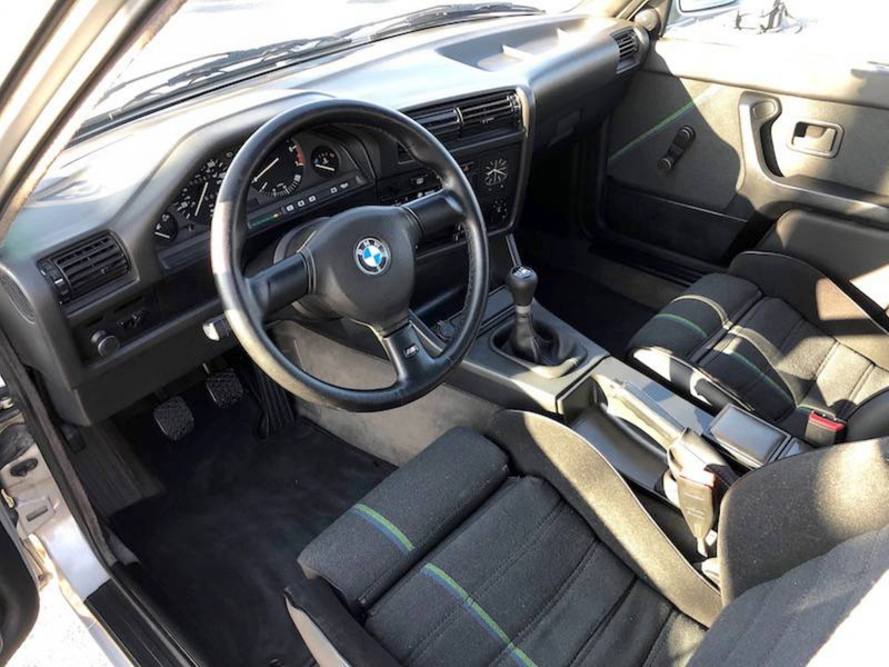 Illustration for article titled At $35,000, Is This S54-Imbued 1990 BMW 318i Touring the Holy Grail or Just Holy Cow?